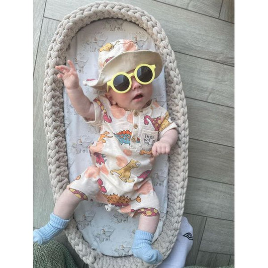 baby inside the changing basket showing its versatile uses