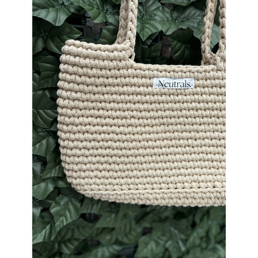 Close up of cream beach bag crochet