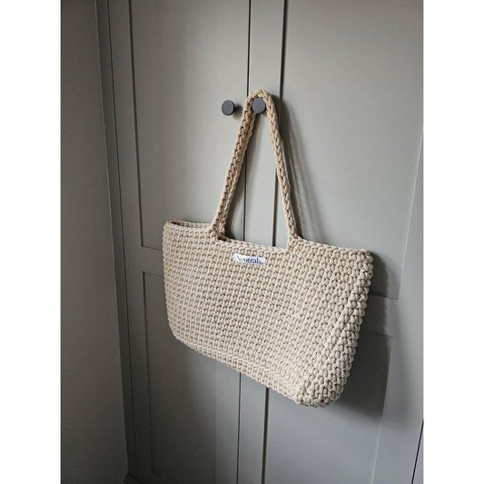 customer photo of large beach bag on a wardrobe