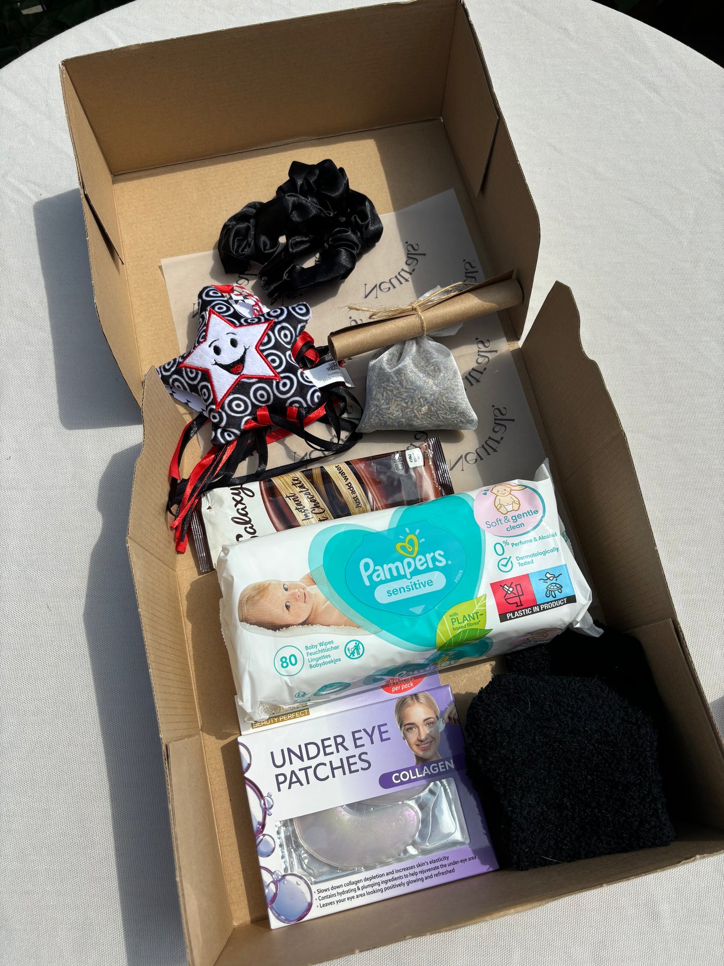 clearly shows what is inside the mum and baby box
