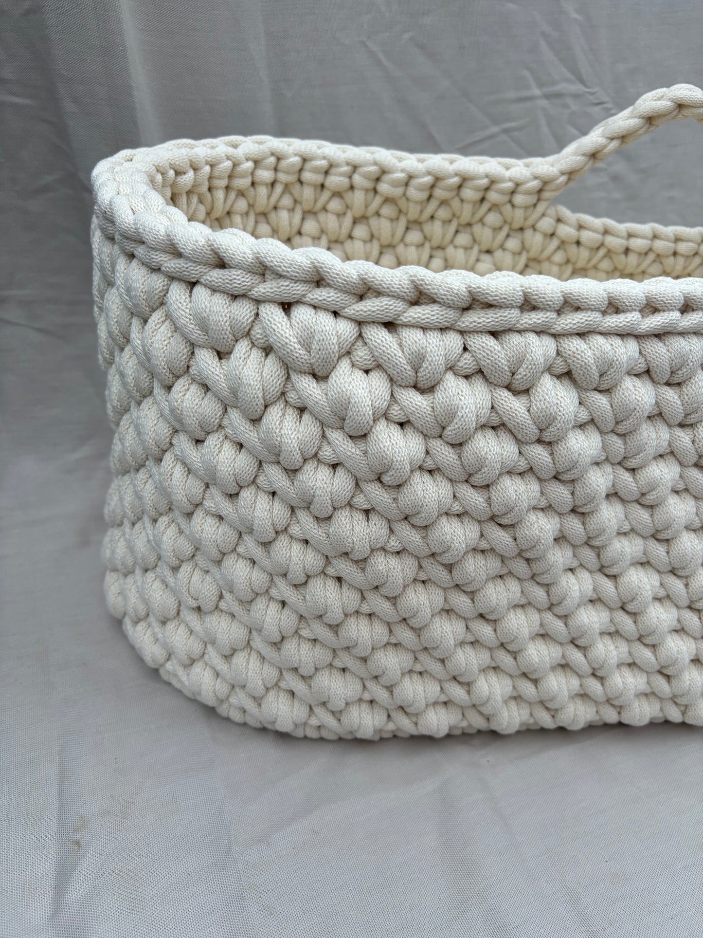 Close up of the vanilla moses basket so you can see the detail and the colour properly