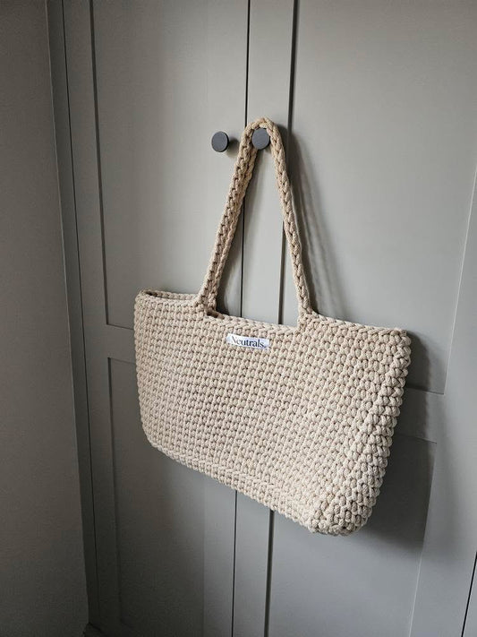 customer photo of large beach bag on a wardrobe