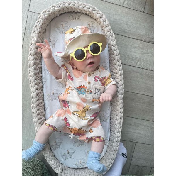 baby inside the changing basket showing its versatile uses 