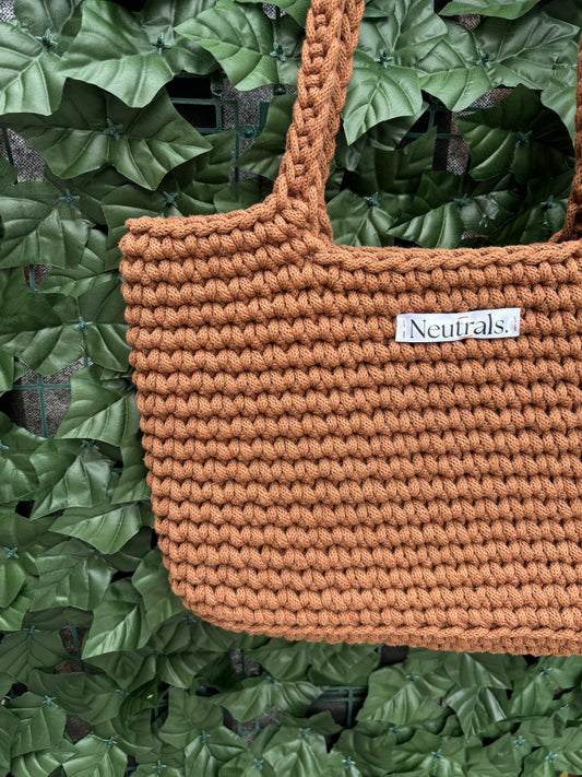 Close up of chocolate beach bag crochet