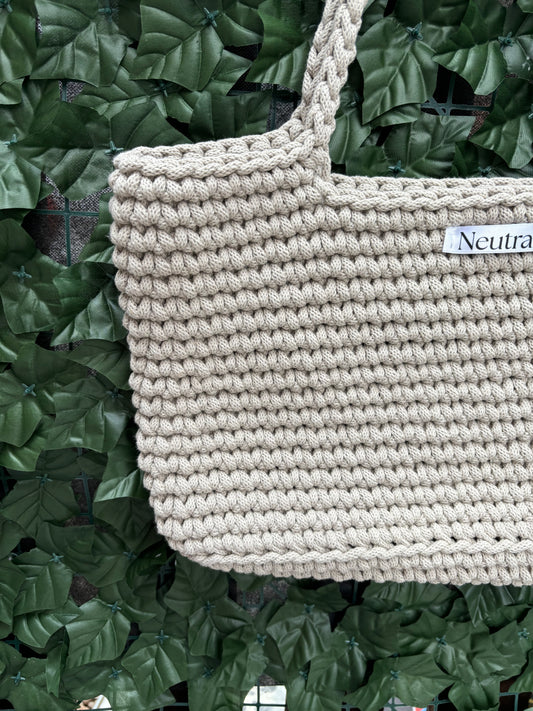 Close up of beige beach bag crochet