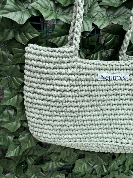 close up of sage beach bag crochet 