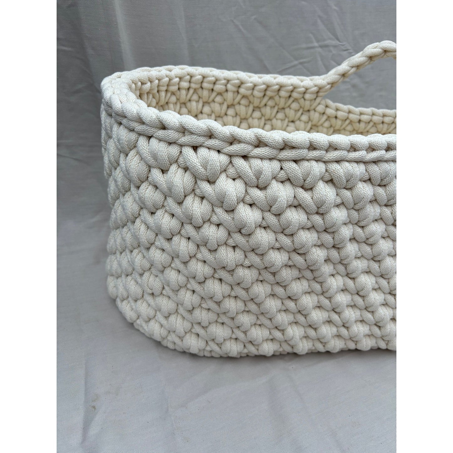 Close up of the vanilla moses basket so you can see the detail and the colour properly