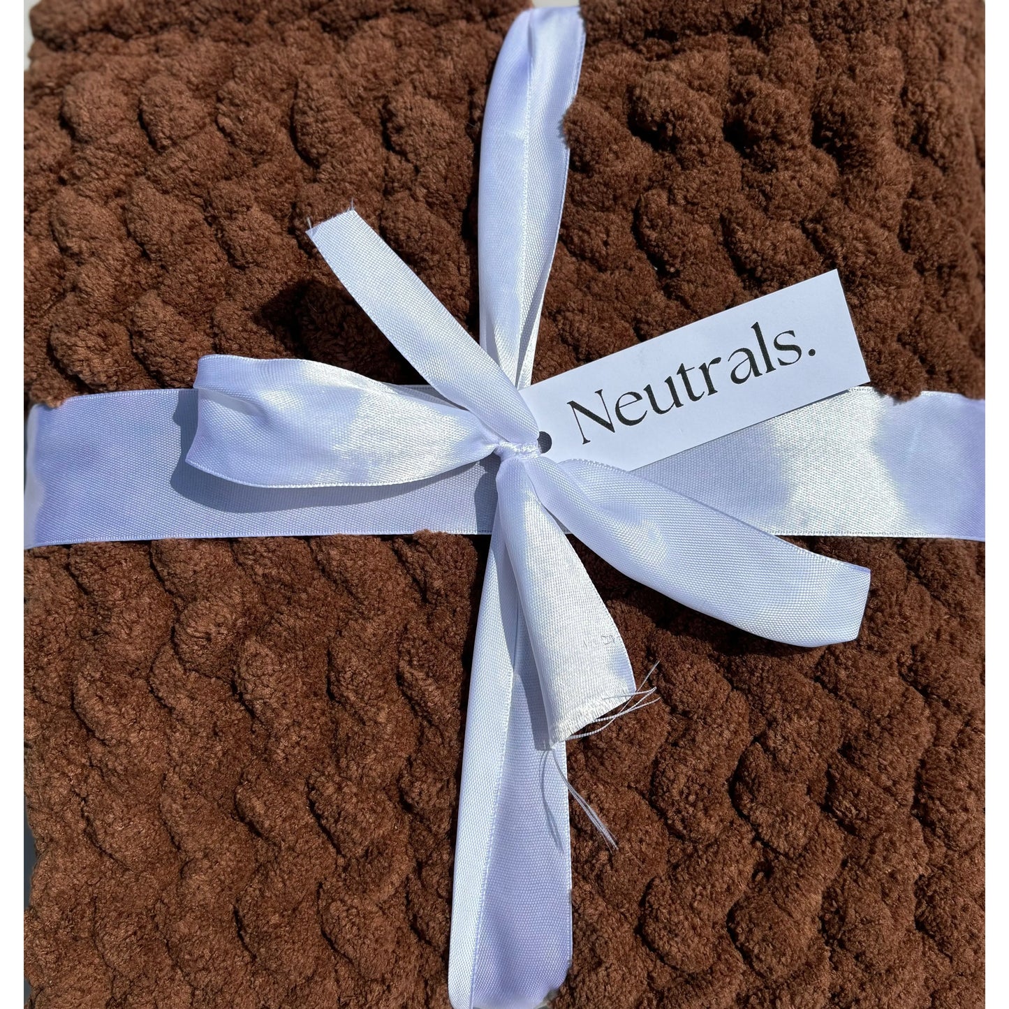 Close up of the chocolate super chunky blanket